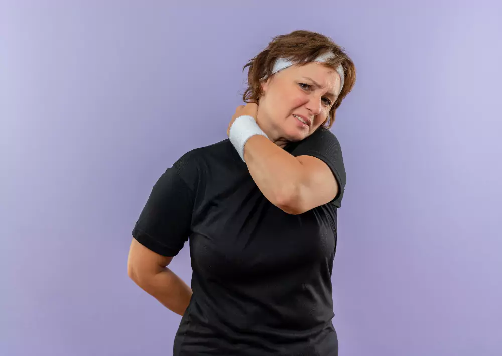 Woman Touching Her Neck Feeling Pain